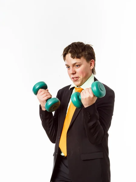 十几岁的男孩穿着办公室西装做体育锻炼 — 图库照片