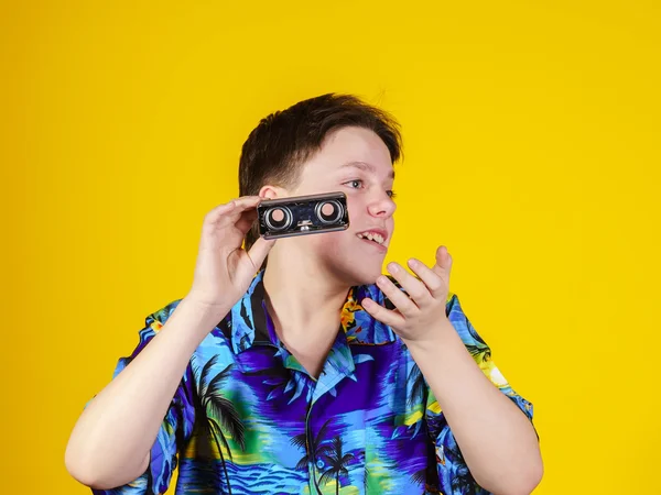 Teenage boy with opera binocular close-up portrait — Stock Photo, Image