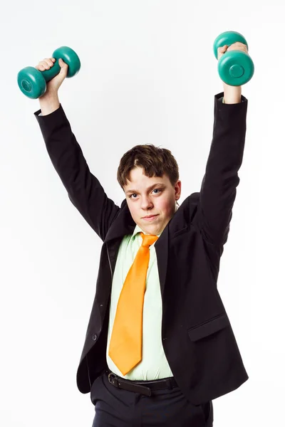 Adolescent garçon habillé dans bureau costume faire sport exercices — Photo