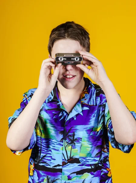 Teenage boy with opera binocular close-up portrait — Stock Photo, Image