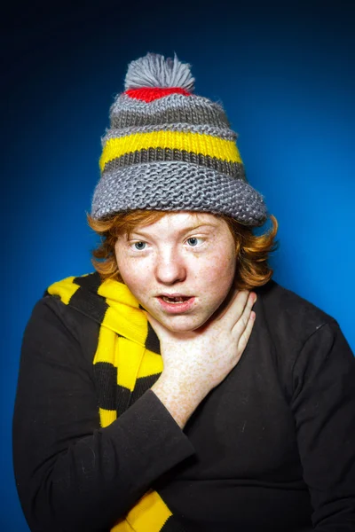 Expressive teenage boy dressed in colorful hat close-up portrait — Stock Photo, Image