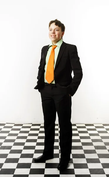 Expressive teenage boy posing in studio — Stock Photo, Image