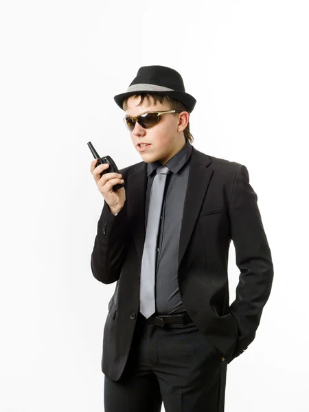 Teenage boy posing like a guardsman with radio transmitter — Stock Photo, Image