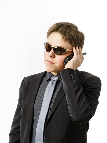 Teenage boy posing like a guardsman with radio transmitter — Stock Photo, Image