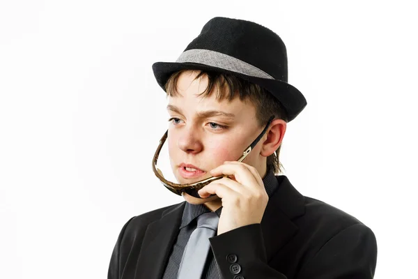 Expressive teenage boy dressed in suit — Stock Photo, Image