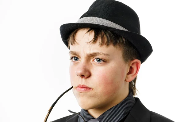 Expressive teenage boy dressed in suit — Stock Photo, Image