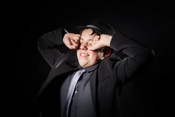 Affective teenage boy dressed in strong suit — Stock Photo, Image