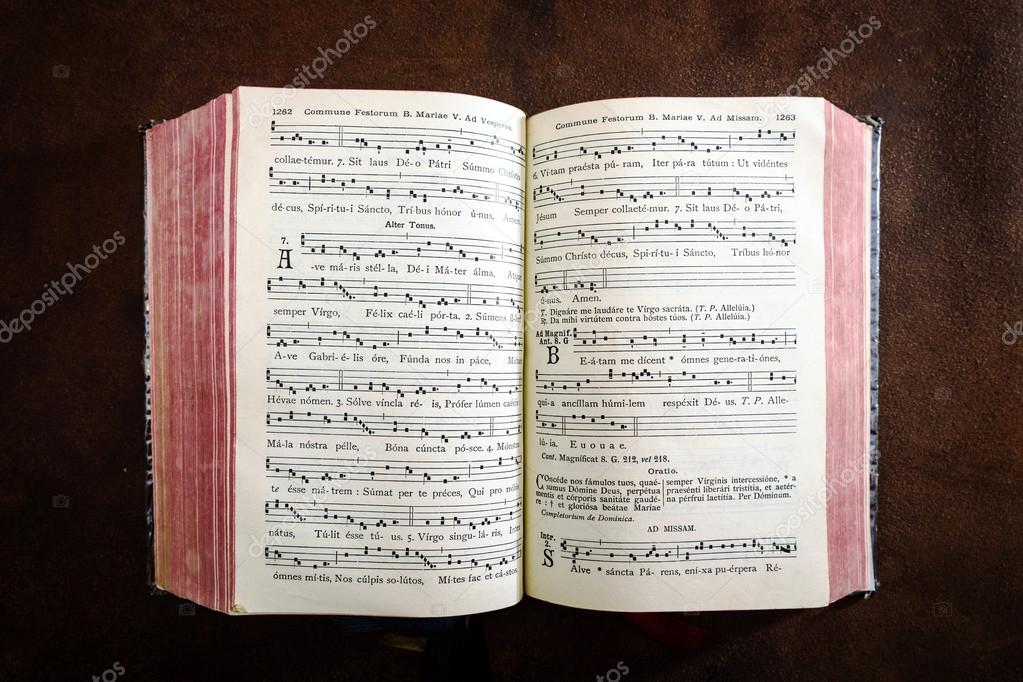 Vintage psalm book with chorus singing notes 