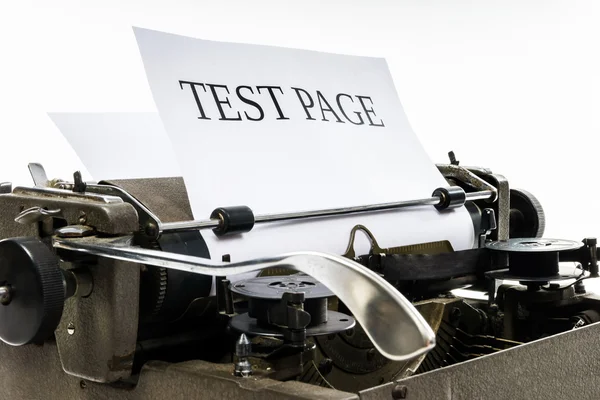 Máquina de escribir antigua vintage con hoja de papel en blanco —  Fotos de Stock