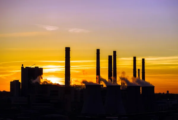 Central heating and power plant on beautiful colorful sunset background — Stock Photo, Image