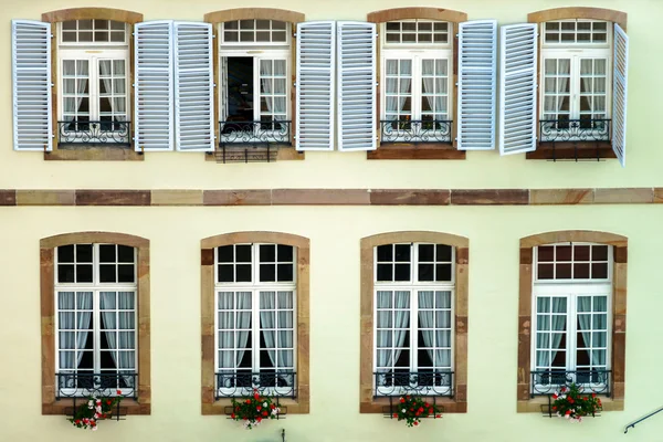 Big pvc window with decoration elements in old french house — Stock Photo, Image