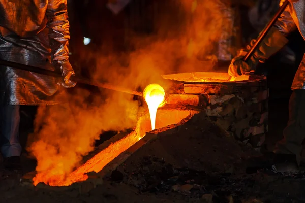 Classic technology of bell producing with melting steel in the g — Stock Photo, Image