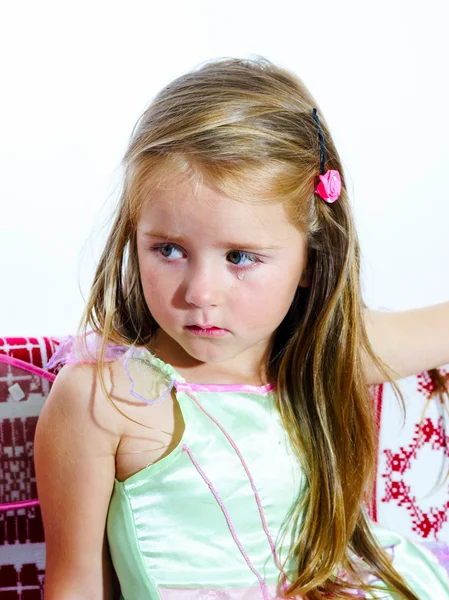 Crying cute little girl with focus on her tears on white backgro — Stock Photo, Image