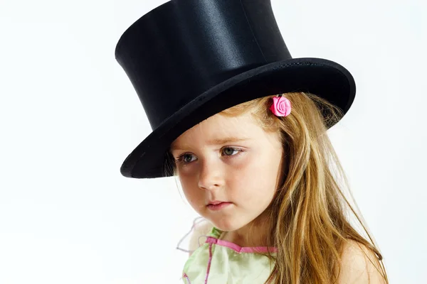 Cute little girl in top hat — Stock Photo, Image