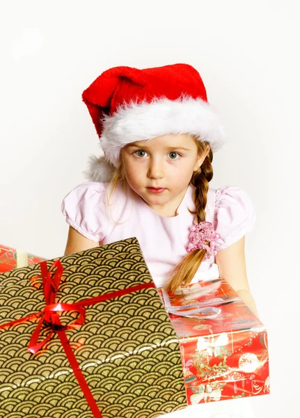 Ta malá holčička, oblečený v santa red hat, nový rok portrét w — Stock fotografie