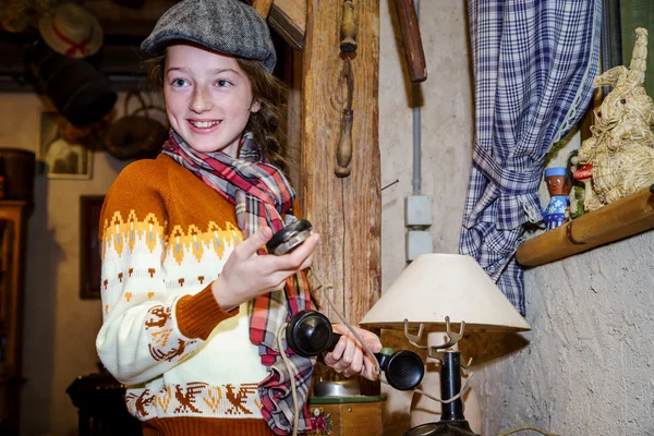 Teenage girl speaking by old vintage telephone — Stock Photo, Image