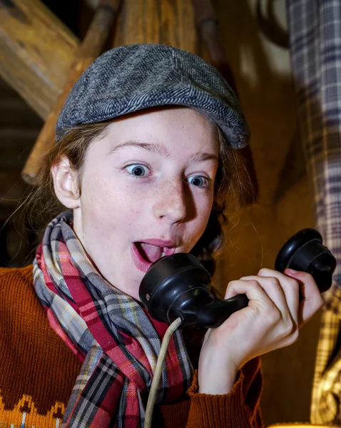 Teenage girl speaking by old vintage telephone — Stock Photo, Image