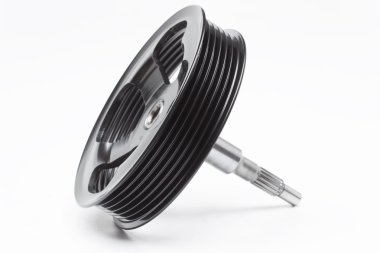 Black pulley car engine on a gray