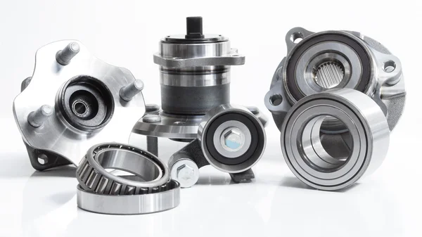 Group bearings and rollers (automobile components) for the engine and chassis suspension — Stock Photo, Image