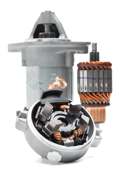 Motor starter, rotor windings and brushes starter on a white