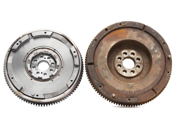 New and old rusty damping flywheels for automotive diesel engines on a white. car parts — Stockfoto