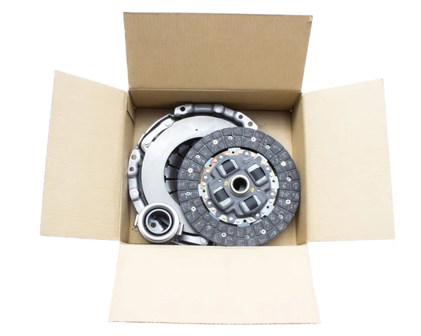 Replacement clutch kit in a cardboard box on a white — 스톡 사진
