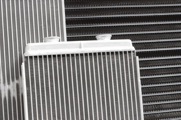 Radiator engine cooling and passenger compartment heating