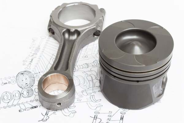 Поршни и соединительные стержни лежат на плоскости механизма рукоятки двигателя внутреннего сгорания
