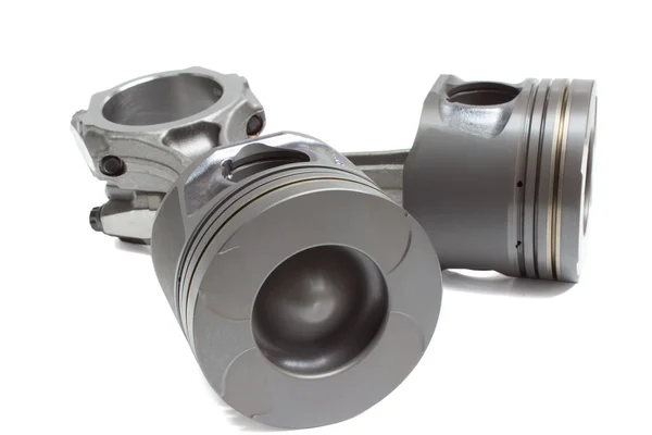 Barras de conexión y pistones, piezas del motor. elementos del mecanismo de manivela aislados sobre un fondo blanco —  Fotos de Stock