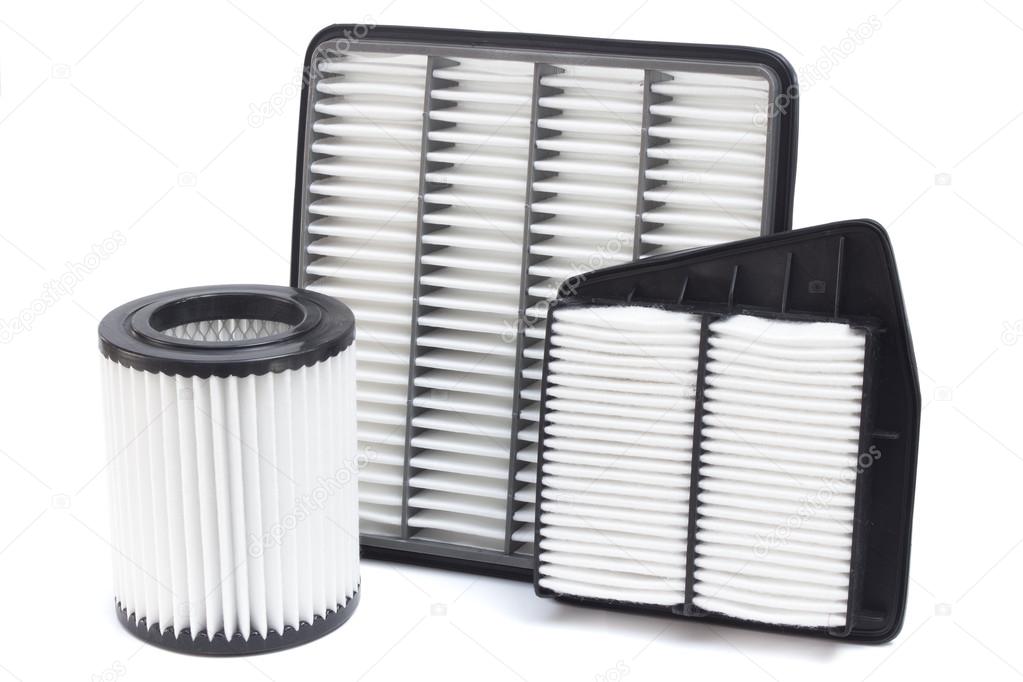 composition of air filters for car engine on a white background