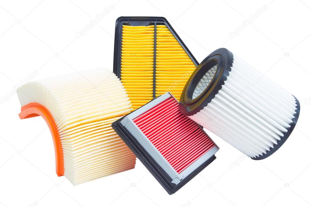 composition of air filters for car engine on a white background