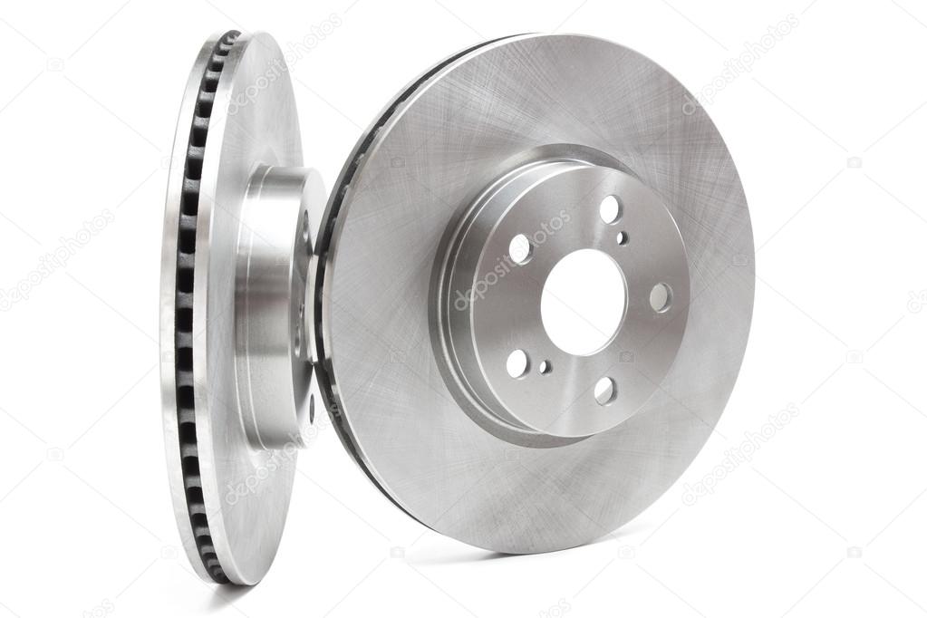 Brake discs and brake pads on a white background. car parts Stock Photo