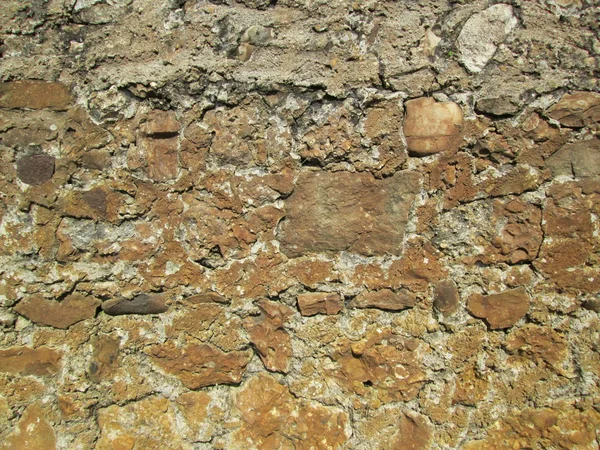 Brown stone and concrete wall — 图库照片