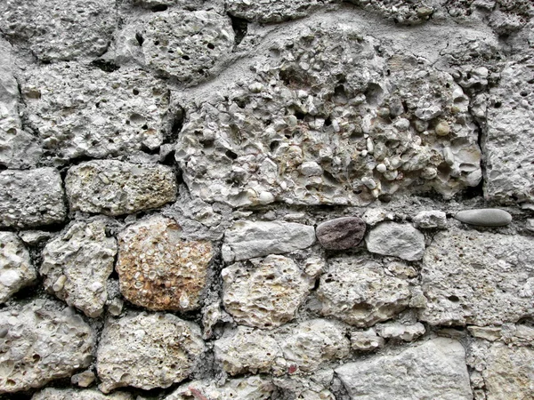 Нерегулярні кам'яною стіною — стокове фото