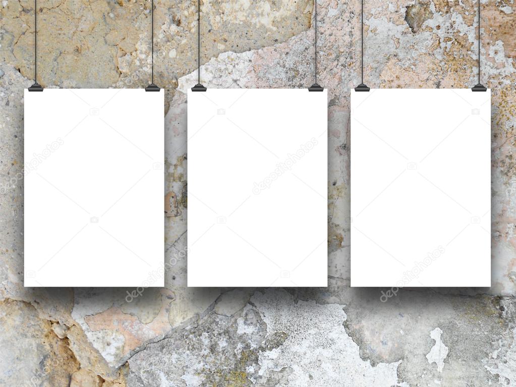 Three paper sheets with clips