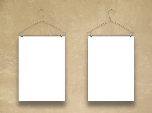 Two vertical paper sheets with clothes hanger — Stock Photo, Image
