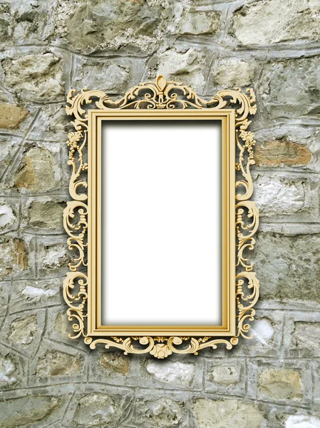 Een gouden barokke frame op middeleeuwse stenen muur — Stockfoto