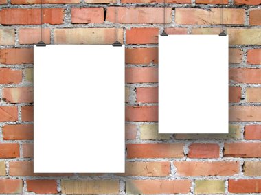 İki asimetrik kağıt yaprak tuğla duvar kliplerle