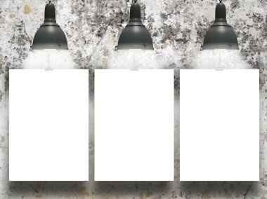 Üç kağıt sayfalarının retro lambaları kalıplı beton duvara astı