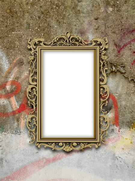 One golden baroque frame on graffiti concrete wall — Stock Photo, Image