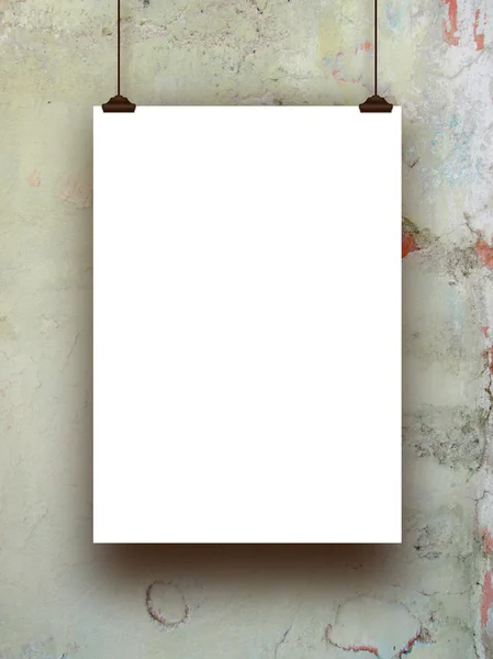 Single hanged paper sheet with clips on stained concrete wall — Stock Photo, Image