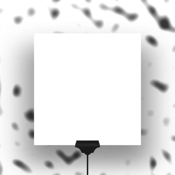 Folha de quadro quadrado pendurado único com clipe no resumo desfocado — Fotografia de Stock