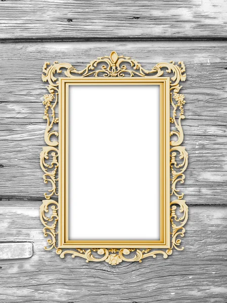 Single golden baroque frame on weathered wooden boards — Stock Photo, Image