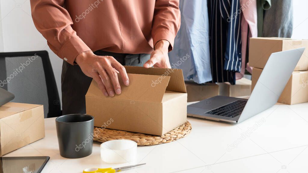 Online small business entrepreneur merchants working at store preparing products to deliver to customers, startup and online business concept