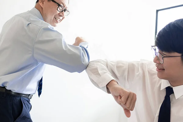 Two Entrepreneurs Touching Elbows Together New Partnership — Stock Photo, Image