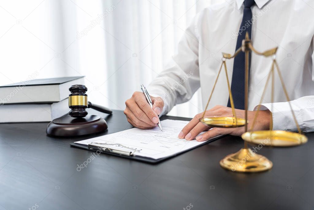 a lawyer checking the correctness in contract used in real estate transaction.