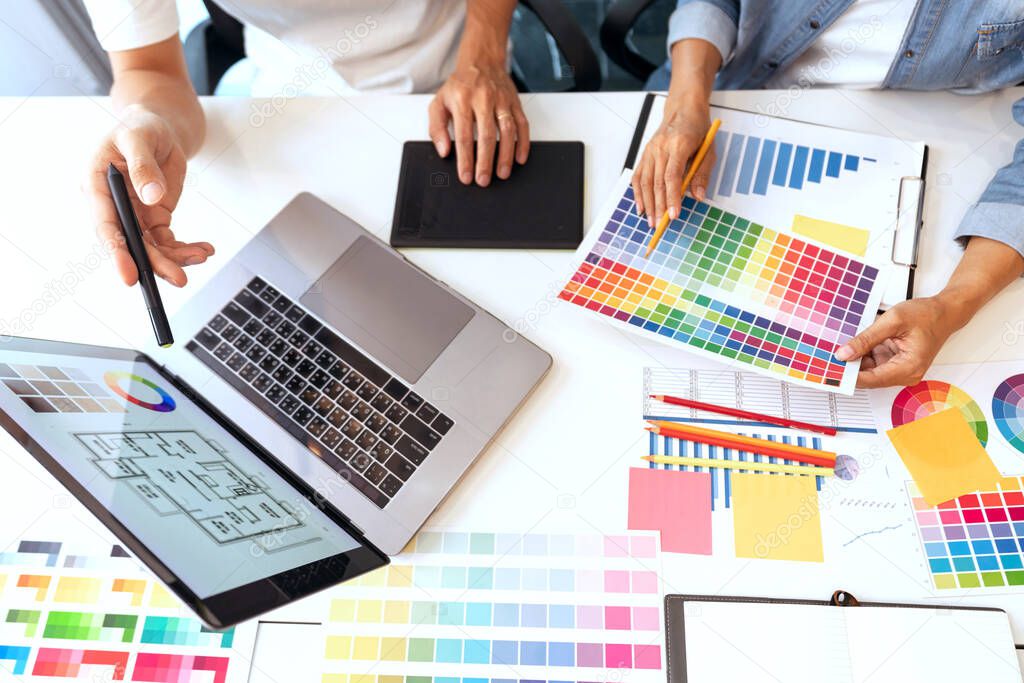 both coworkers designing some products choosing the appropriate shade.