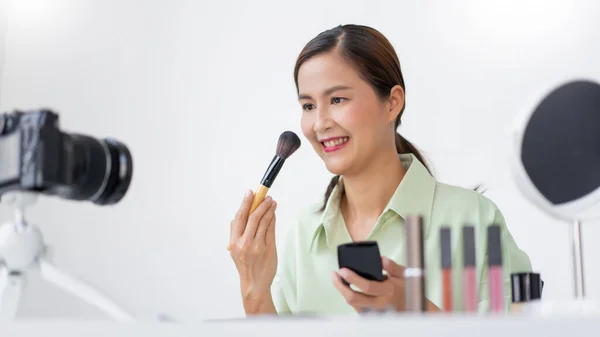 Beauty Influencer Applying Powder Blush Her Cheek Using Makeup Brush — Stock Photo, Image