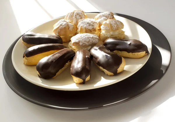 Prăjituri Eclair și cremă — Fotografie, imagine de stoc