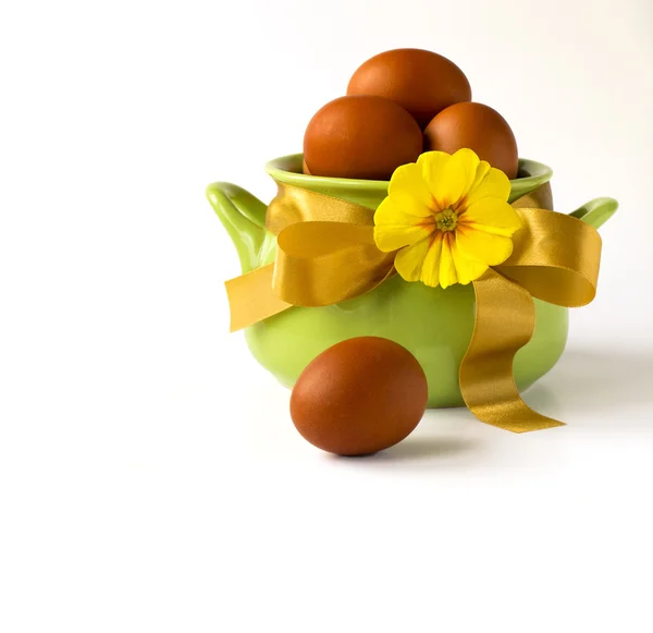 Easter greeting card - easter eggs in basket — Stock Photo, Image